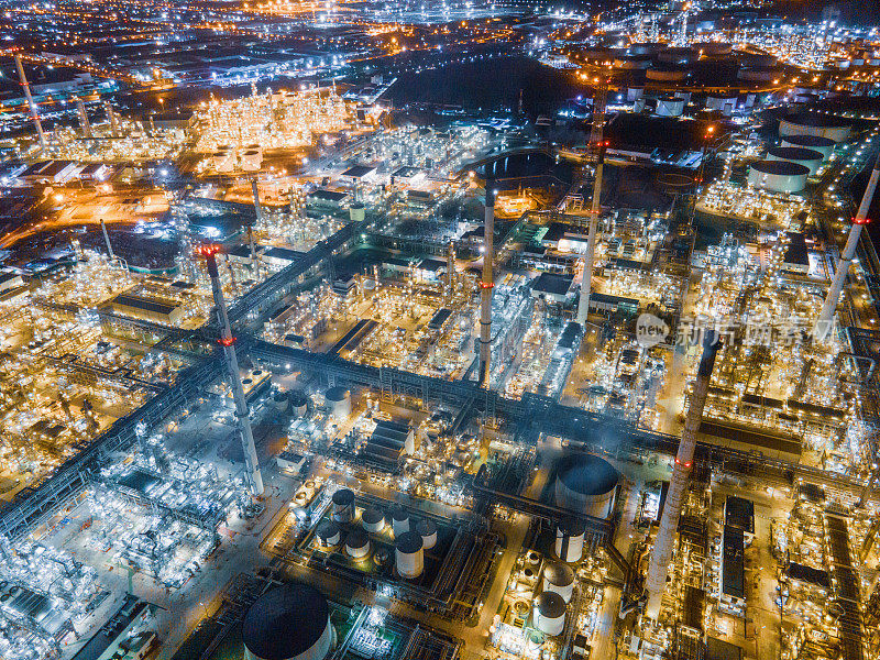 Aerial view of Oil refinery and gas industry in Petrochemical plant at twilight